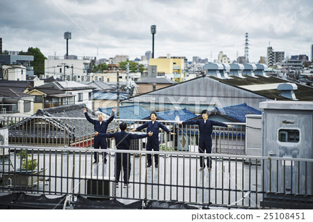 Workers doing gymnastics 25108451