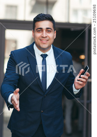 Man stretching out hand for handshake Man stretching out hand for handshake 25109698