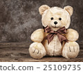 vintage teddy bear on old boards 25109735