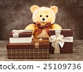 homemade teddy bear and a lot of boxes with gifts 25109736