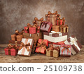 Green gift boxes for christmas on board 25109738