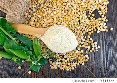 Flour pea in spoon on board top Flour pea in spoon on board top 25111177