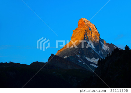 Matterhorn in early morning with alpenglow.  25111596