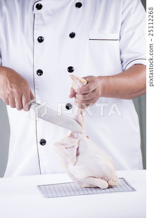 Chef prepared chopping raw chicken Chef prepared chopping raw chicken 25112268