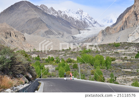 Famous family and walking patha village Karakoram Highway in Pakistan and beautiful Paso glacier 25118576