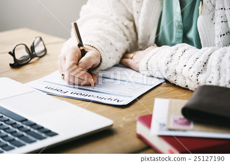 Senior Woman Filling Application Form Documents Concept 25127190