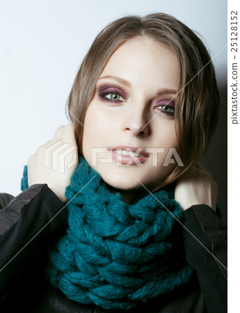 young pretty real woman in sweater and scarf all young pretty real woman in sweater and scarf all 25128152