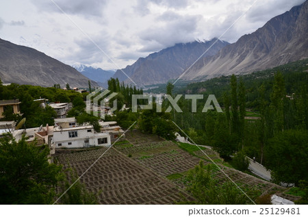 Beautiful mountains and the cityscape seen from hotels in the heart of Hunzan Khalimabad in Pakistan Beautiful mountains and the cityscape seen from hotels in the heart of Hunzan Khalimabad in Pakistan 25129481