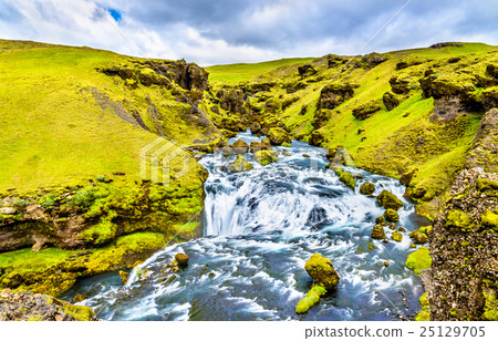 One of numerous waterfalls on the Skoga River - 25129705
