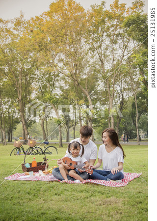 Beautiful family,Happy Asian Family In Garden 25131985