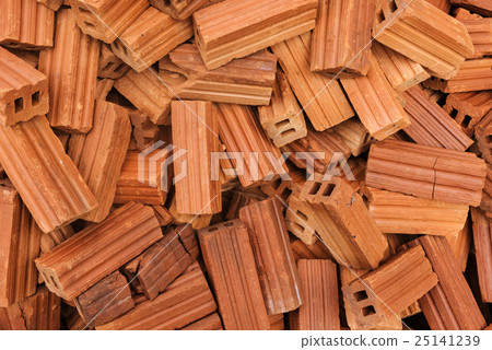 Heap of unarranged bricks for construction 25141239