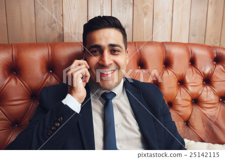 Happy smiling businessman portrait, free space 25142115