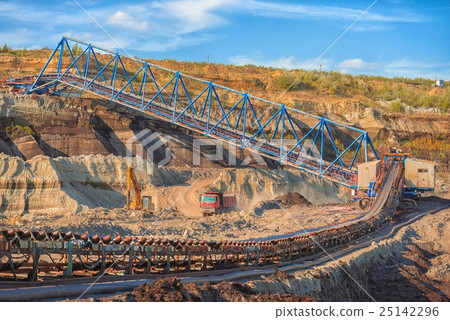 Long conveyor belt transporting ore Long conveyor belt transporting ore 25142296