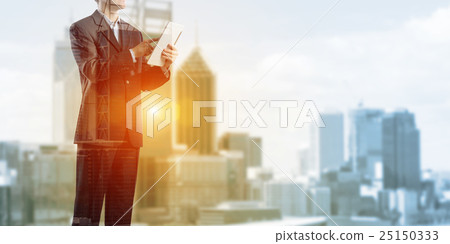 Businessman use tablet pc 25150333