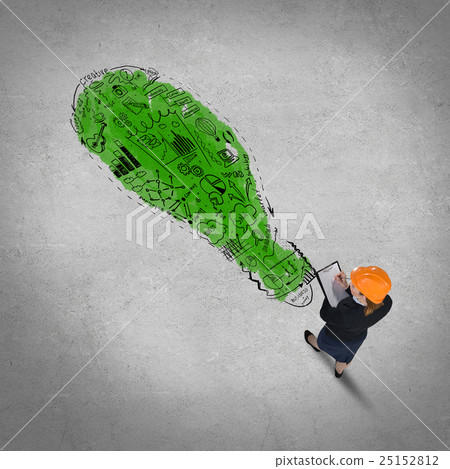 Woman builder with folder in hands Woman builder with folder in hands 25152812