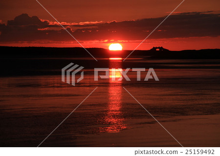 Landscape photograph of the sunset stained in Akane color of Lake Saroma, Evening landscape in Hokkaido 25159492