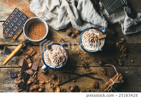 Hot chocolate with whipped cream, nuts and Hot chocolate with whipped cream, nuts and 25163428