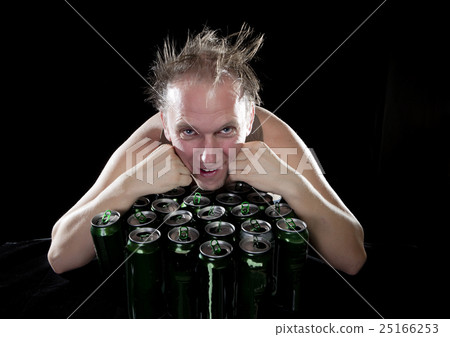 The happy tipsy man near empty beer jars The happy tipsy man near empty beer jars 25166253