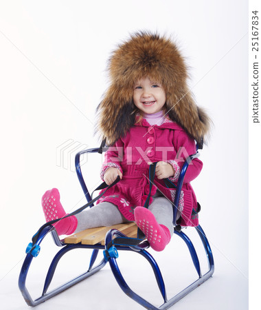little girl with sled on white background 25167834