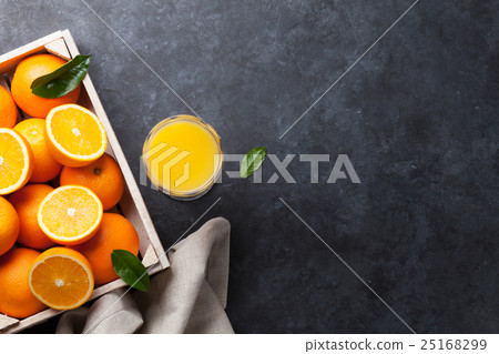 Fresh orange fruits and juice Fresh orange fruits and juice 25168299