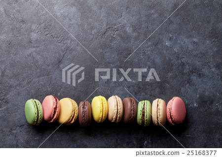Colorful macaroons on stone table. Sweet macarons Colorful macaroons on stone table. Sweet macarons 25168377