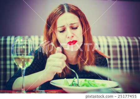 Portrait of funny woman plays the fool eats salad Portrait of funny woman plays the fool eats salad 25177455