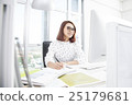 Smiling asian businesswoman working at office desk 25179681