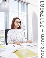 Asian businesswoman working at computer in office 25179683