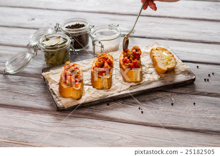 Toasts with vegetables. 25182505