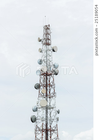 Communications tower on cloudy background Communications tower on cloudy background 25189054