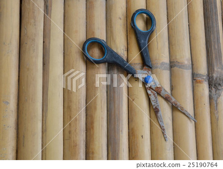 scissor on bamboo table scissor on bamboo table 25190764