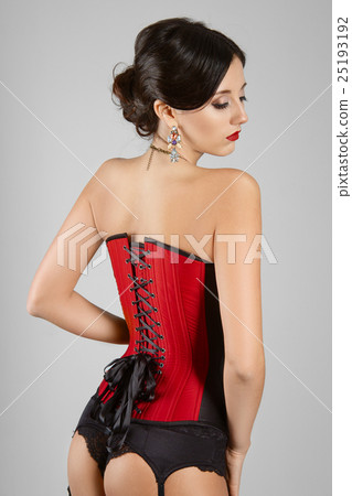 Sexy girl in burlesque corset and lingerie posing  25193192