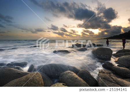 Sea and rock at the sunset. Nature composition. 25194141
