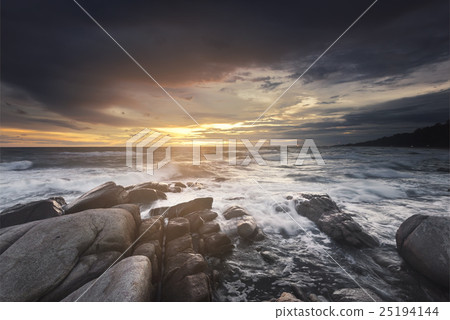 zone 3 sunlight ray on rock at tropical beach  25194144
