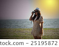 woman take photo near beach 25195872