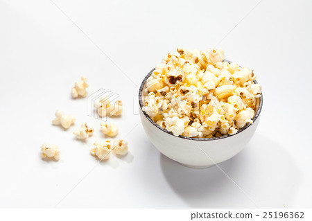 Popcorn in a dish on a white Popcorn in a dish on a white 25196362