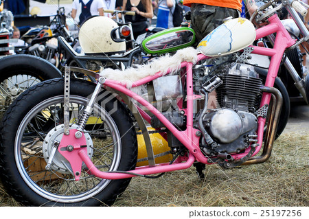 Old garage for a motorcycle repair with the tool b 25197256