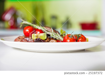 Meat dish with vegetables 25197372