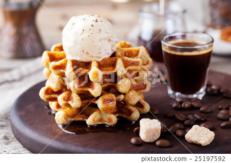Fresh whole wheat waffles, ice cream, maple syrup 25197592