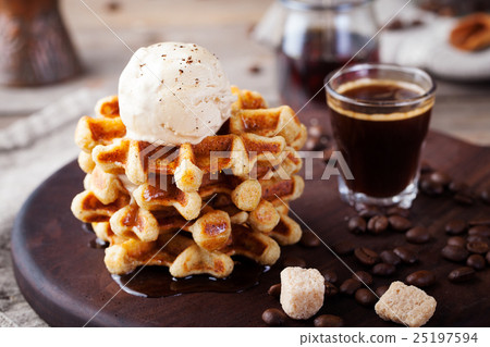 Fresh whole wheat waffles, ice cream, maple syrup Fresh whole wheat waffles, ice cream, maple syrup 25197594
