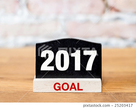 New year 2017 goal on blackboard on table 25203417