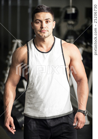 Young well built man training in a gym 25206730