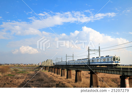8000 series train of Tobu Noda line crossing the Edogawa bridge in winter season 8000 series train of Tobu Noda line crossing the Edogawa bridge in winter season 25207279