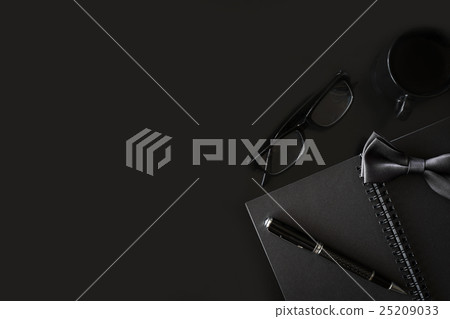 Black notebook with copyspace and cup of coffee Black notebook with copyspace and cup of coffee 25209033