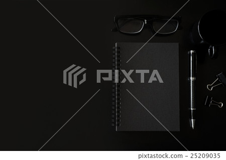 Black notebook with copyspace and cup of coffee Black notebook with copyspace and cup of coffee 25209035