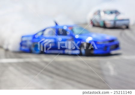 Blurred image of drifting car on track 25211140