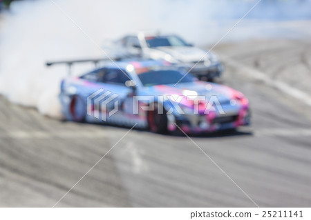 Blurred image of drifting car on track Blurred image of drifting car on track 25211141