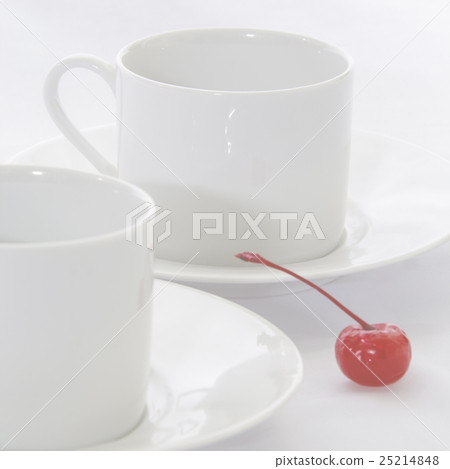 Cup of coffee with red cherry on white background Cup of coffee with red cherry on white background 25214848