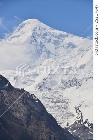 Dylan peak and beautiful cloud seen from Hunzakalibabad in Pakistan 25217047