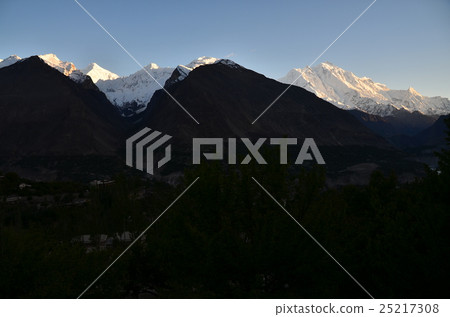 Beautiful mountains and villages from Rakaposhi and Dylan peak seen from Hunzakalibabad at dusk of Pakistan Beautiful mountains and villages from Rakaposhi and Dylan peak seen from Hunzakalibabad at dusk of Pakistan 25217308